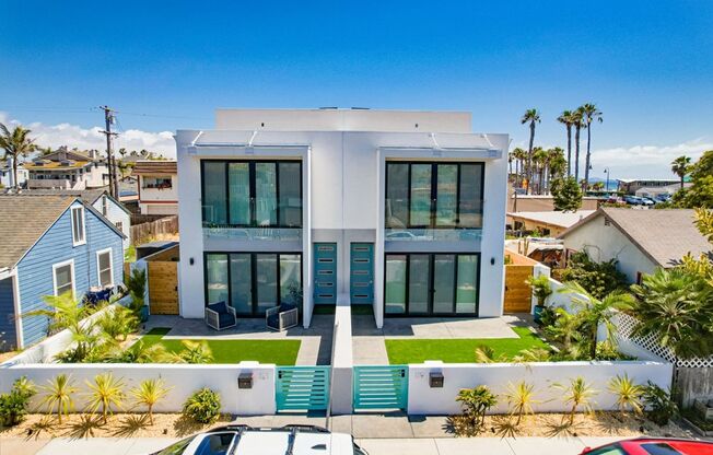 Luxury Coastal Townhome | Private Rooftop + Private Garage | Steps to the Beach