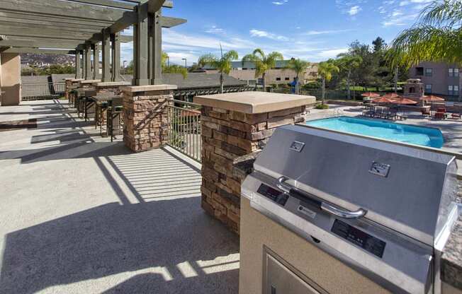 Luxury Apartments in Rancho Bernardo, San Diego, CA - The Reserve at 4S Ranch - Grill Area with View of the Pool