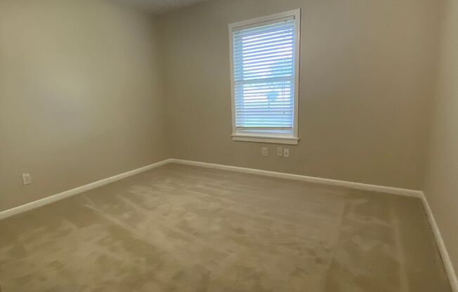 3 Bedroom , 1.5 Bathroom Brick home with carport and fenced yard, with shed,