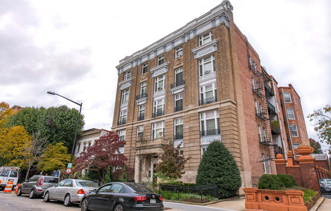 exterior of brick apartment building at dupont apartments in washington dc