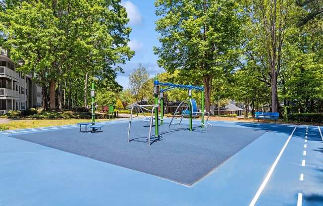 Outdoor Gym and Track Area at Dunwoody Village Apartments in Atlanta, GA.