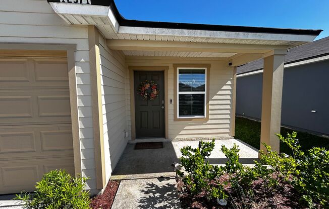 Picturesque Waterfront 4-Bedroom Home with Premium Amenities + 3 Car Garage! Community Amenities!