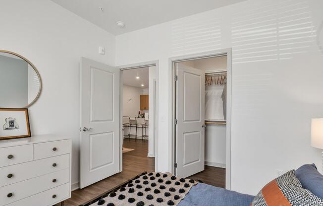 a bedroom and a closet at Apex apartments in Colorado Springs, CO