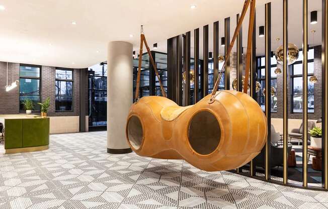 A large wooden structure in a room with a checkered floor.