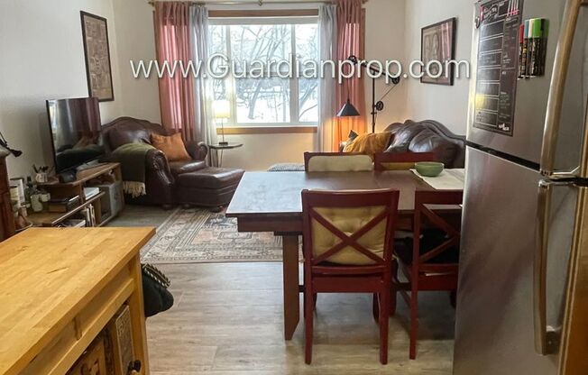 Northeast Renovated Corner Unit Main Floor, Parking, Very Bright, USI Connected