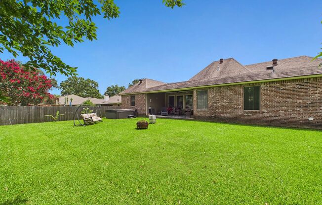 Nestled in the desirable Quail Hollow Subdivision