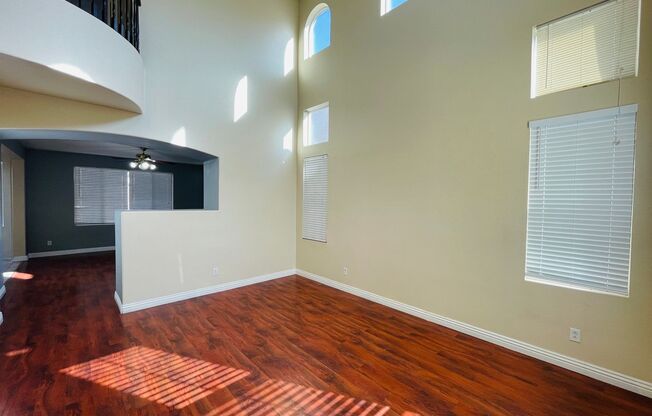 Large 5 bedroom family home right off of Blue Diamond, in gated community, with a full bedroom and bathroom downstairs!