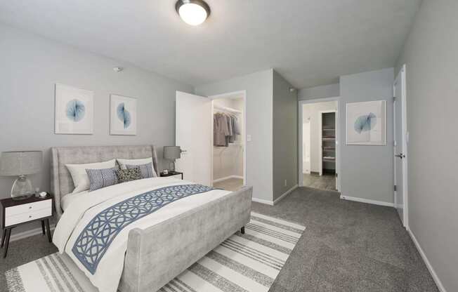 Large bedroom with spacious walk in closet and space to spare.