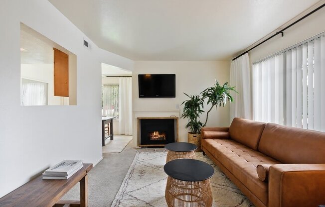 Model living room showcasing fireplace