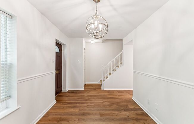 What a treat it will be, coming home to this lovely brick townhome in the southern end of Old Town!