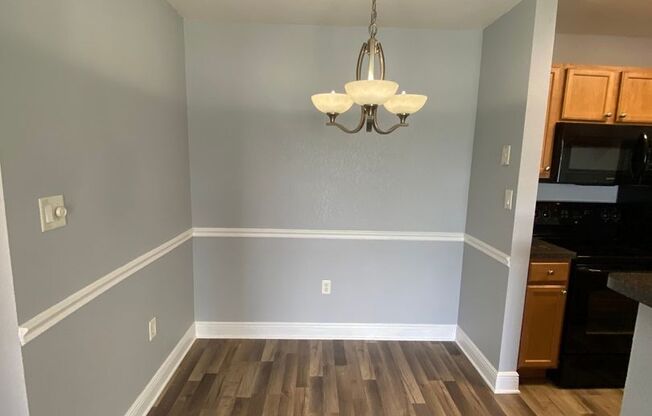 1/1 in the Heart of Brandon with a lake view!