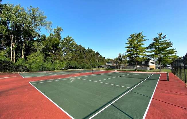 Outdoor tennis court at Camelot East Apartments, Ohio