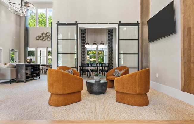 Langley Pointe Apartments | Clubhouse w/ Seating Area
