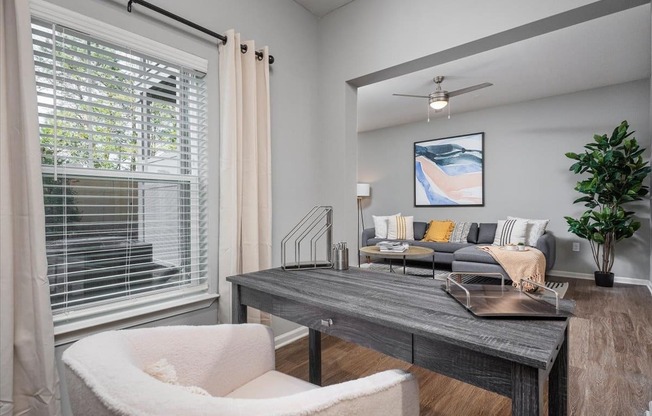 a living room with a couch and a table