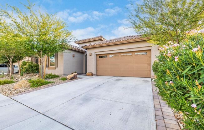 Gorgeous single level 4-bedroom, 3-bathroom home nestled in an upscale gated community in Peoria