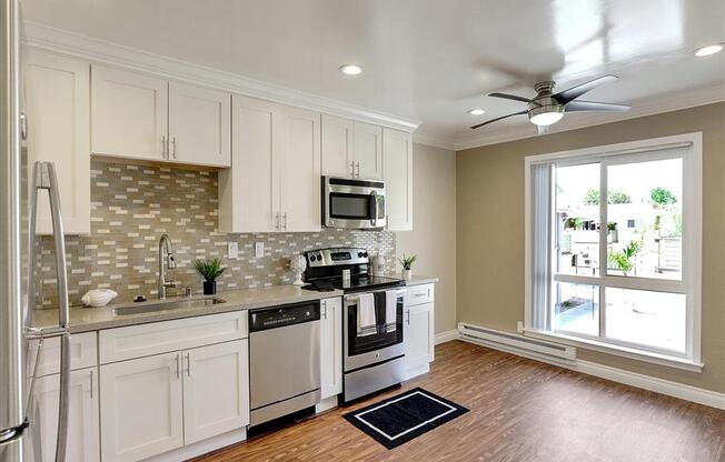 Modern Kitchen With Stainless Steel Appliances And Double Door Refrigerators at Casa Alberta Apartments, Sunnyvale, CA