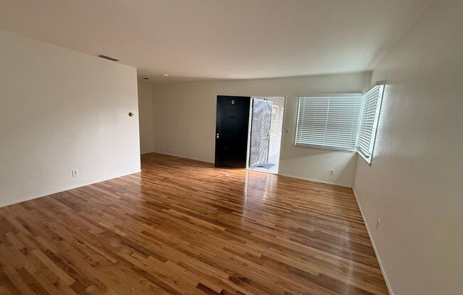 Fresh 2 bedroom 1 bath upper unit ready to rent! Small garage included!.