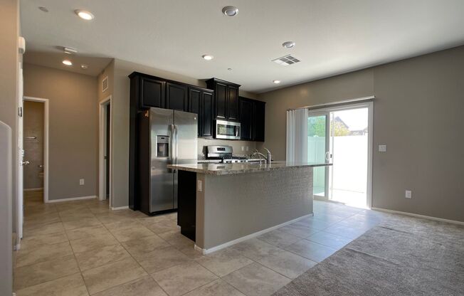 GATED 3 BED 2.5 BATH 2 CAR GARAGE TOWNHOME W/ LOFT + BED & SHOWER DOWNSTAIRS IN NLV