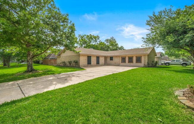 Lovely 3 bedroom 2 bath w/ potential 4 bedroom or game room. Full Privacy fence backyard with large patio!