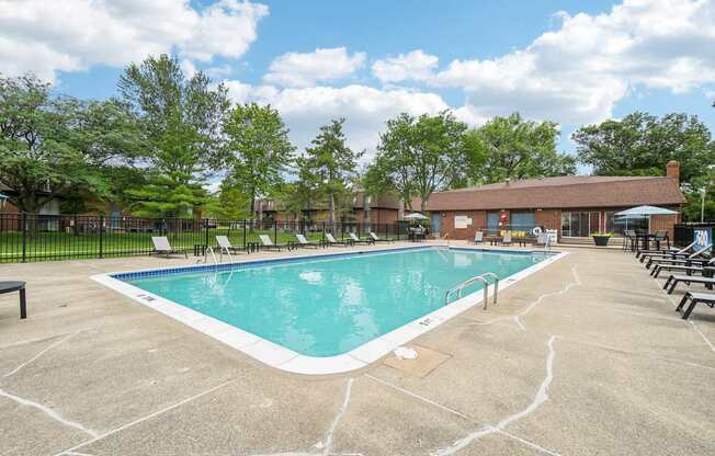 Heated pool and sundeck at Drawbridge Apartments in Harrison Township, MI.