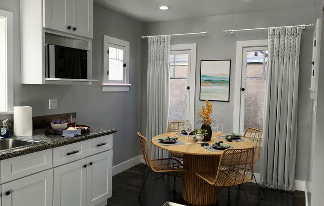 Lovely detached back house w/ 2car garage