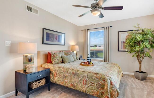 Light color apartment bedroom with tall window