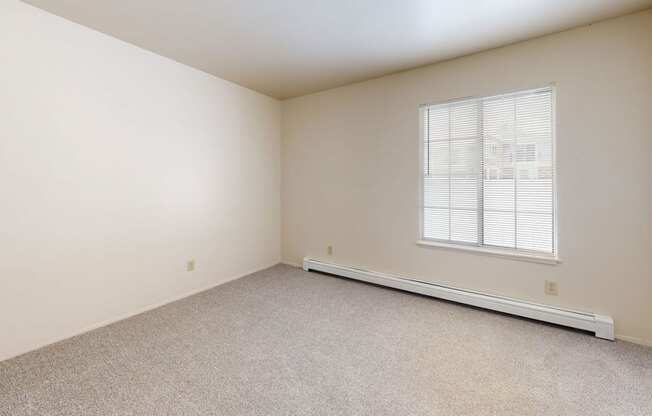 bedroom with a large window