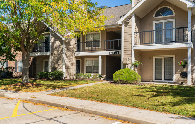 Mature and Manicured Landscaping in front of an Apartment Building at Pelican Cove