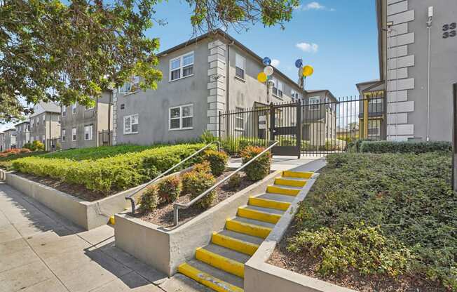 A set of yellow steps lead up to a building.