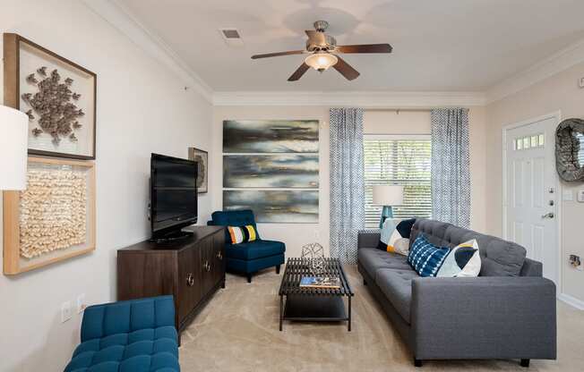 Carrington at Shoal Creek - Staged living room with ceiling fan