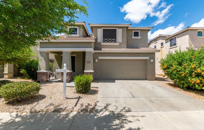 Welcome home to this stunning Surprise home with 4 beds and 2.5 baths!