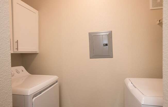 A laundry room with a washer and dryer at Sunset Summit, Rocklin, CA, 95765