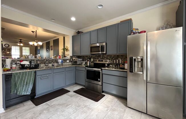 Charming 2BD, 2.5BA Cary Townhome with Storage Unit, Assigned Parking, and HOA Amenities