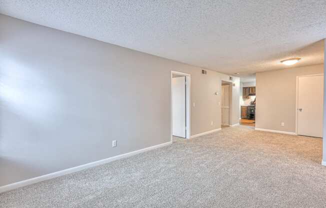 A spacious room with carpeted floor and white walls at Landmark at Lyncrest Reserve Apartments, Nashville, Tennessee