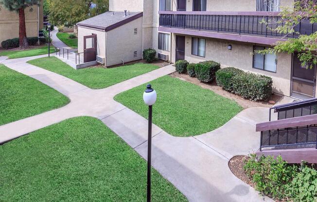 a house with a lawn in front of a building