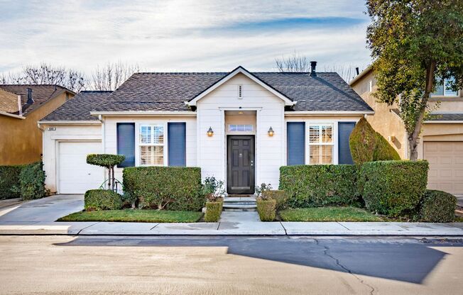 European Parc one-level home w/private rear yard backing to ponding basin