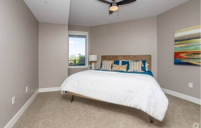 Comfortable Bedroom at Waterside at RiverPark Place; Louisville Apartments