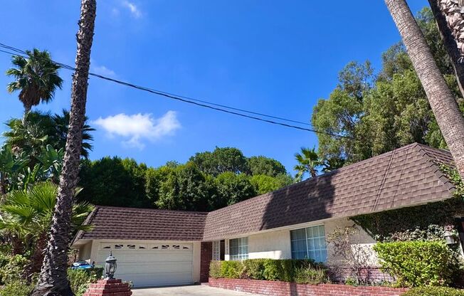Beautifully remodeled 4 bedroom house in prime Woodland Hills Neighborhood