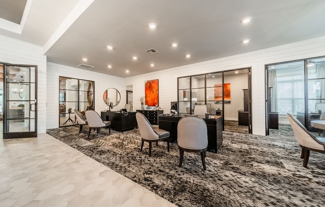 a living room with a table and chairs and sliding glass doors
