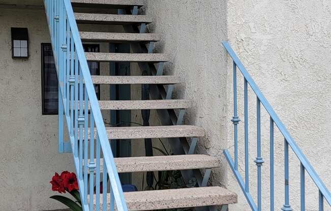 Stairway to second floor apartment at Magnolia Apartments in Riverside, California.