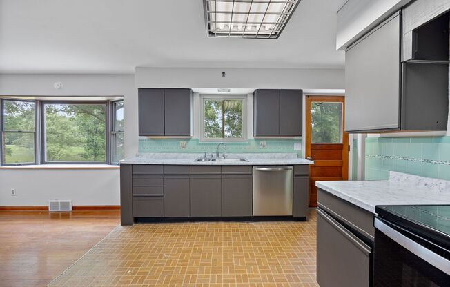 GREEN TWNSHP-2 bedroom 1.5 bath brick ranch w/ fireplace & 1 car garage