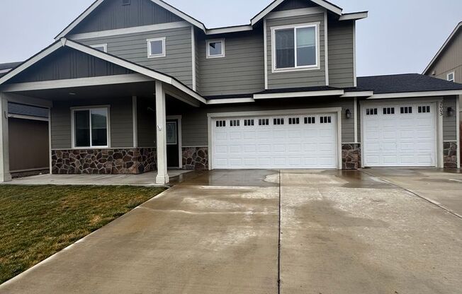 Spacious 5-Bedroom Home with Fenced Yard & Oversized Garage