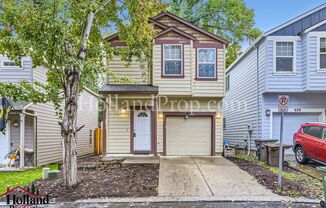 Charming Two-Level Home with Fenced Yard in Hillsboro's Quiet Cul-de-Sac!