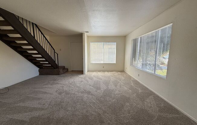 Large Two Story Condo with Two Car Detached Garage and Water/Trash Included