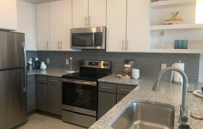 Spacious new kitchen with granite counter tops at Link Apartments® Mixson, North Charleston, SC, 29405