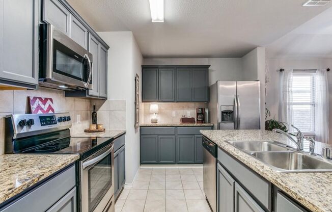 This beautiful 4 bedroom, 2 bath home is located within walking distance to pool, parks & playgrounds