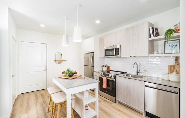 A bright kitchen with clean finishes, modern appliances, and space to cook, gather, and start your day.