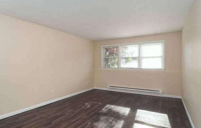 Room with wooden floor at Springwood Gardens, New Britain