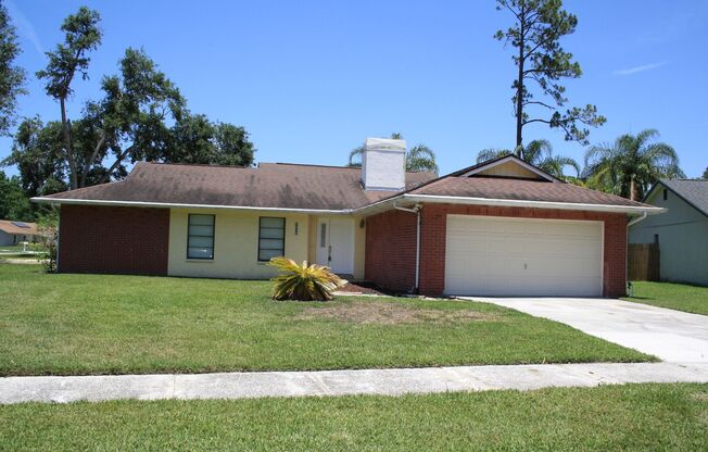 Enjoy Peaceful Living in this Northdale Corner Lot Single Family Home