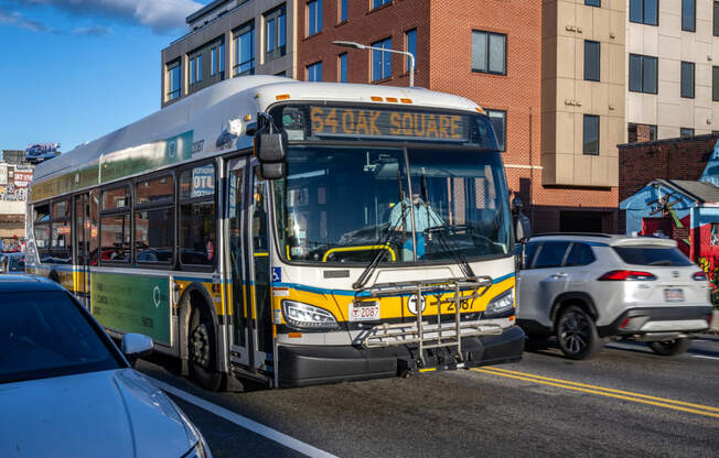 a city bus driving down a busy city street